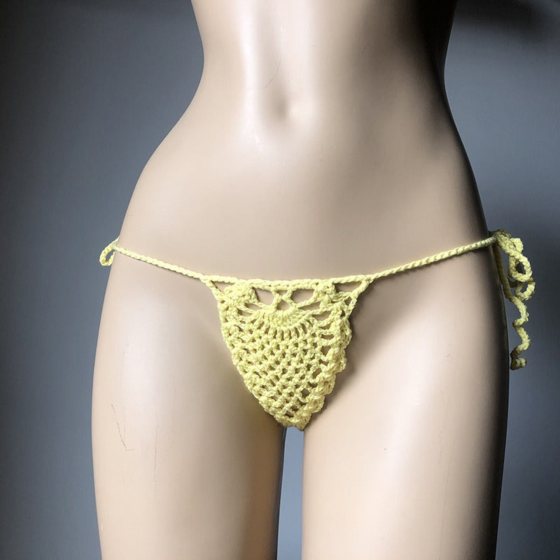 European and American fashion modern retro style Instagram beach handmade woven flower bud fun hollow out shorts
