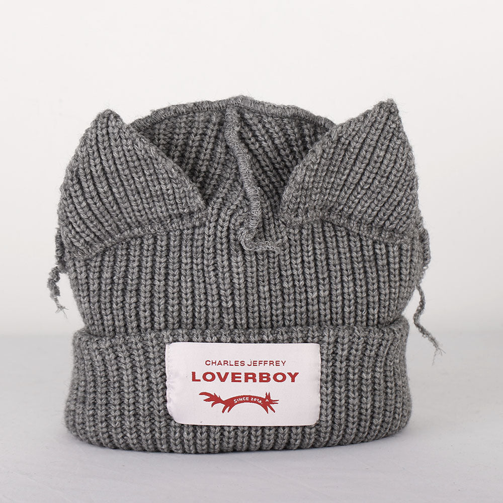 Double-layer thickened pig ear wool hat autumn and winter warm solid color knitted hat