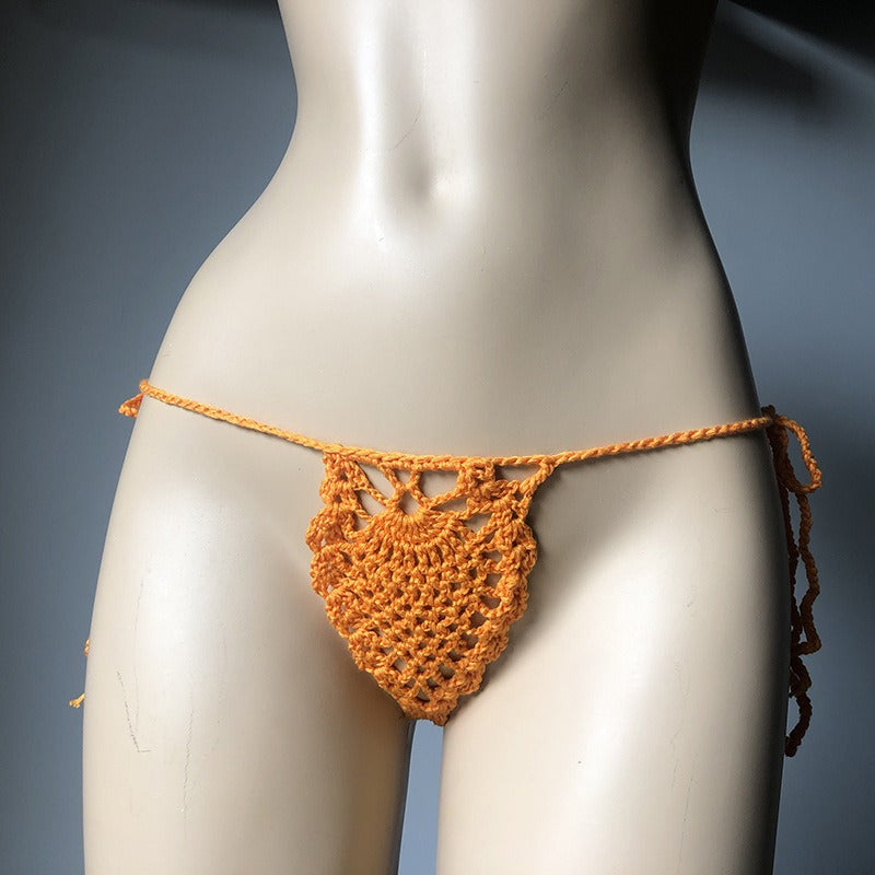 European and American fashion modern retro style Instagram beach handmade woven flower bud fun hollow out shorts